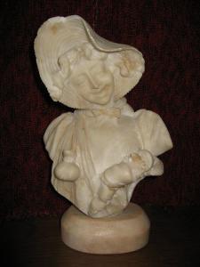 Bust of a young girl. Marble sculpture. Early 20th century.